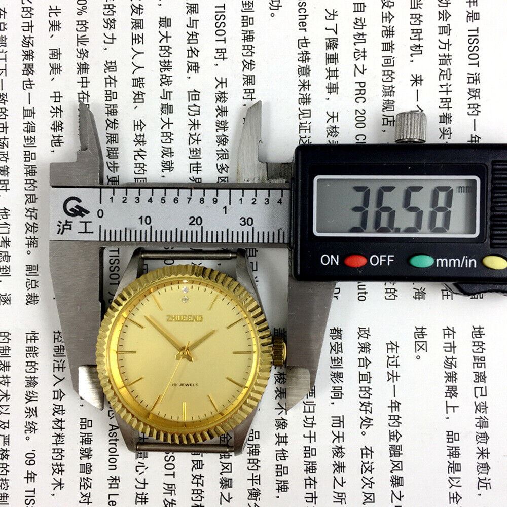 Tianjin Factory round golden dial manual mechanical watch with classic Chinese craftsmanship and elegant design.