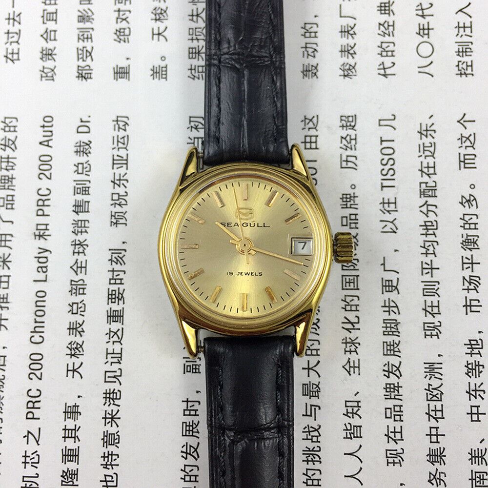 Golden dial Seagull Lady Watch with 19 jewels, manual mechanical movement, elegant design by Tianjin Factory.