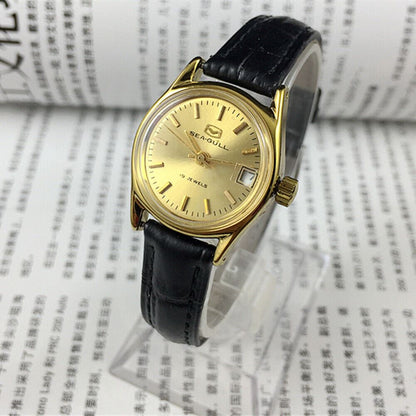 Seagull Lady Watch with golden dial, 19 jewels, manual mechanical movement, classic Tianjin elegance.