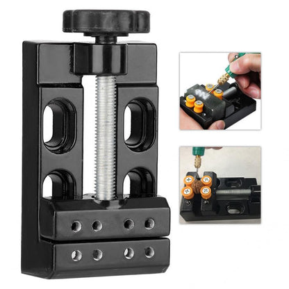 Mini electric drill with flat vice and clip opening table clamp for precise jewelry crafting.