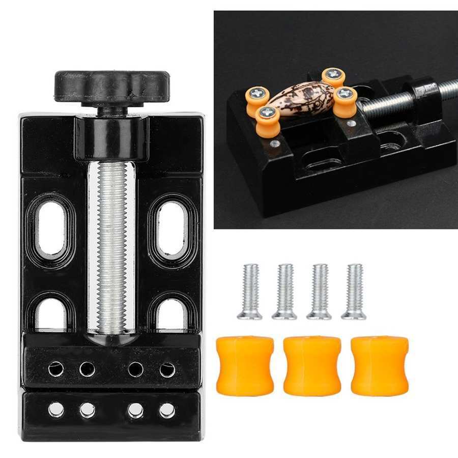 Mini electric drill with flat vice and clip opening table clamp for precise jewelry crafting.