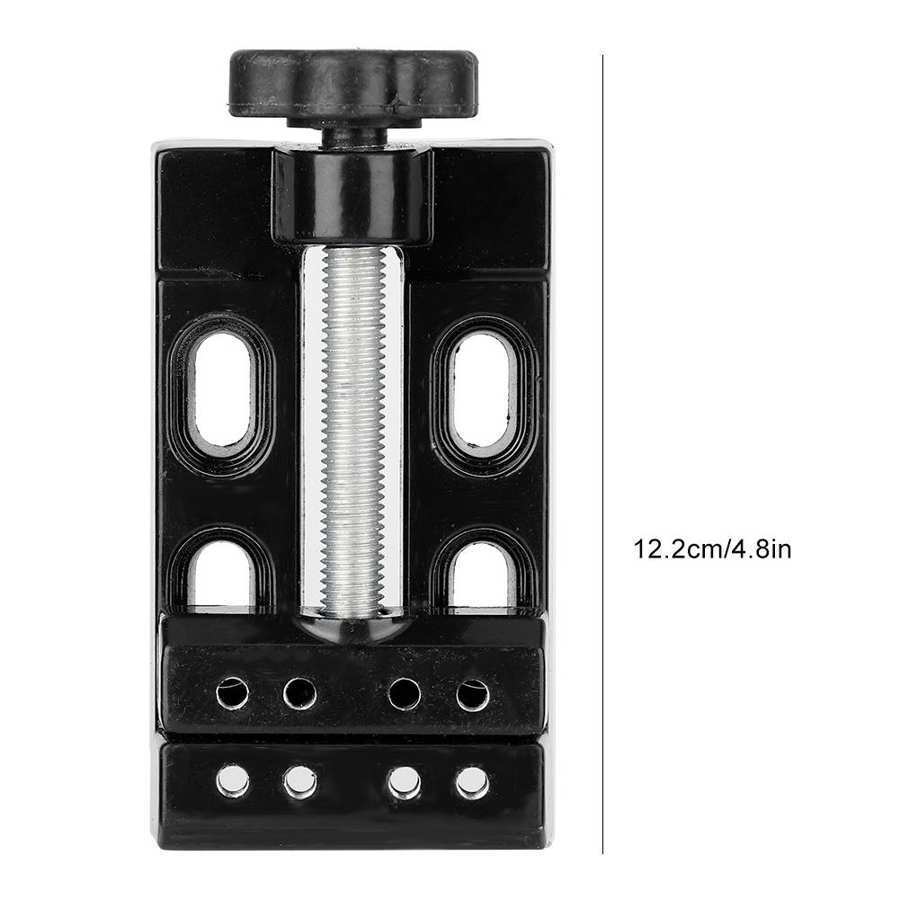Mini electric drill with flat vice and clip opening table clamp for precise jewelry work.