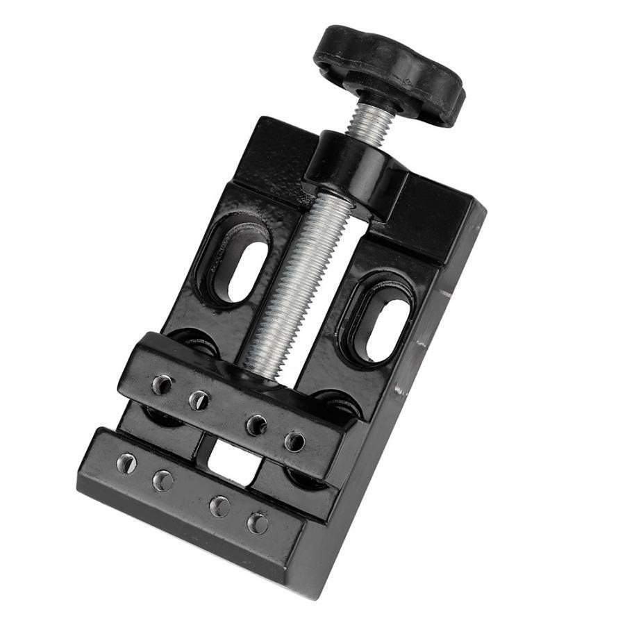 Mini electric drill with flat vice and clip-opening table clamp for detailed jewelry crafting.
