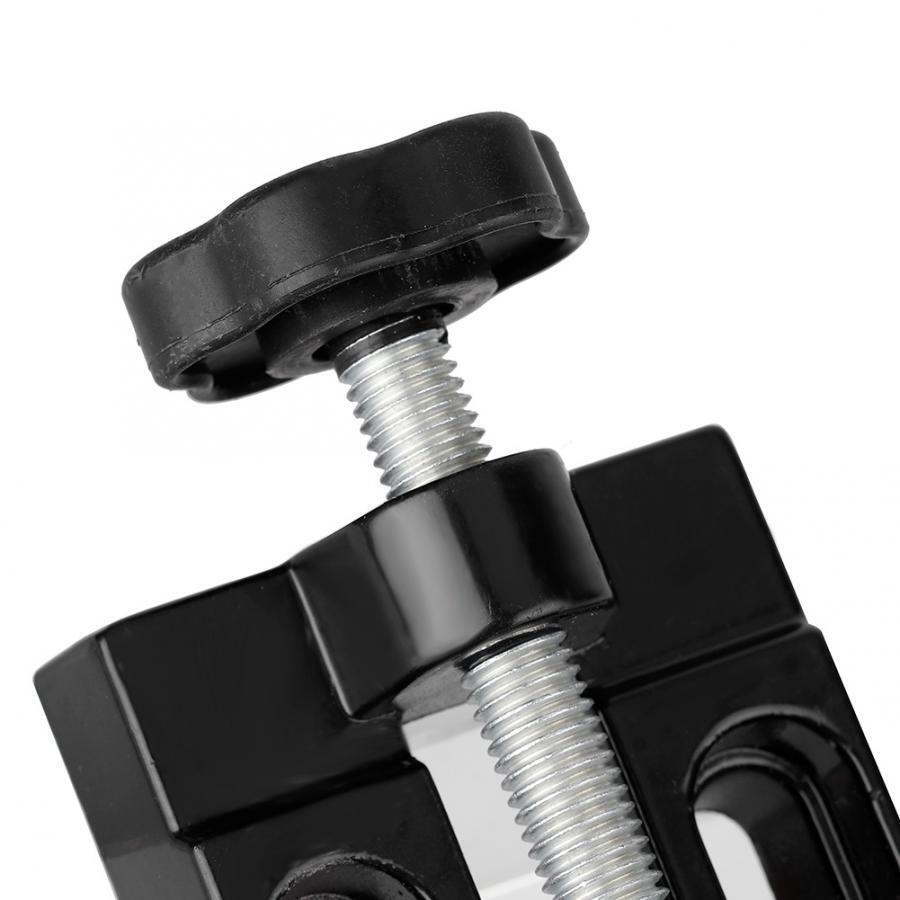 Mini electric drill with flat vice and clip opening table clamp, ideal for precise jewelry crafting.