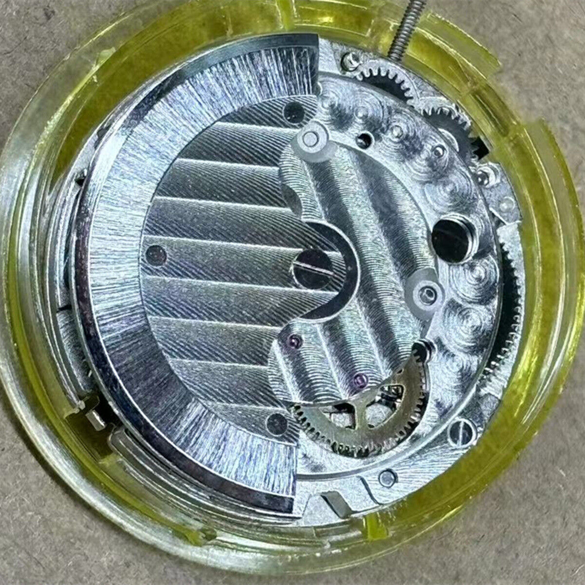 Mingzhu 2813 automatic watch movement showing moon star phase at 6 o'clock position with precision craftsmanship.