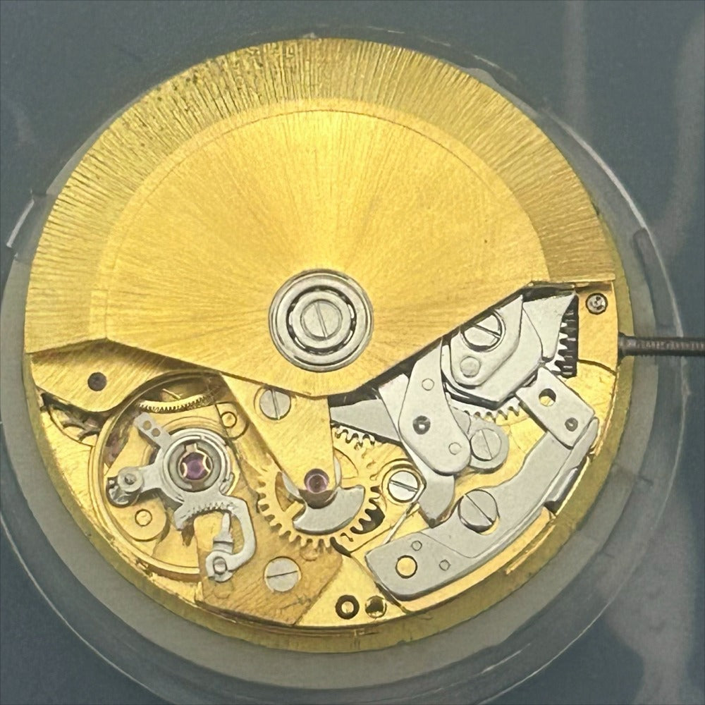 Golden Dandong 7750 mechanical watch movement featuring small seconds at 3, 6, and 9 o'clock, precision Chinese engineering.