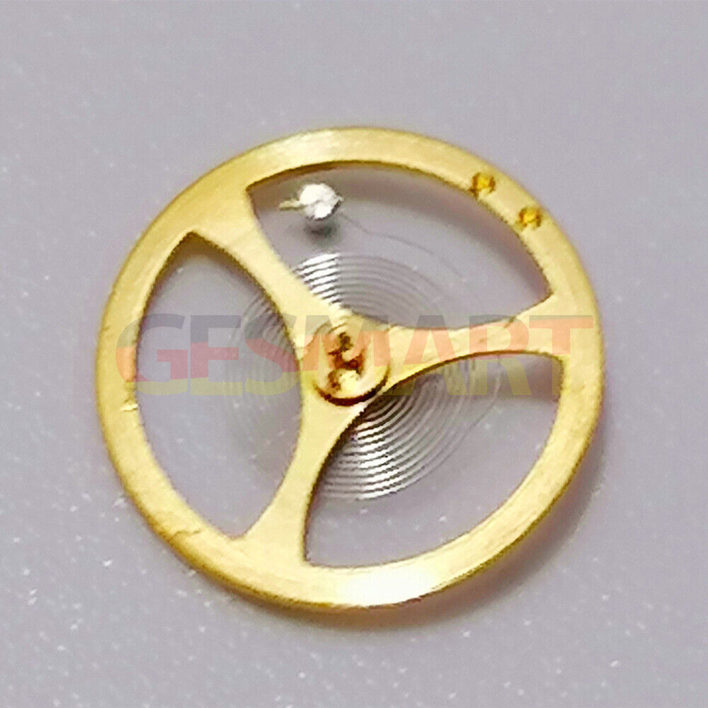 Golden balance wheel with hairspring for Orient 46941 watch movement, precision replacement part by Orient.