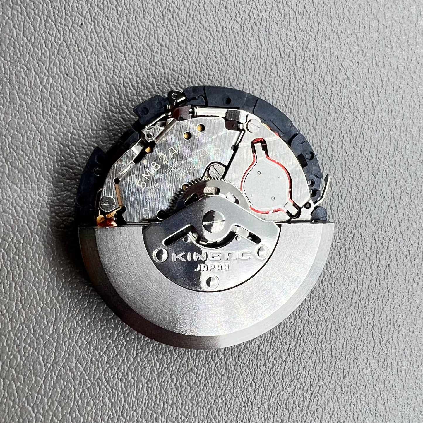 Seiko Japan 5M82A quartz watch movement for precise timekeeping and reliability.