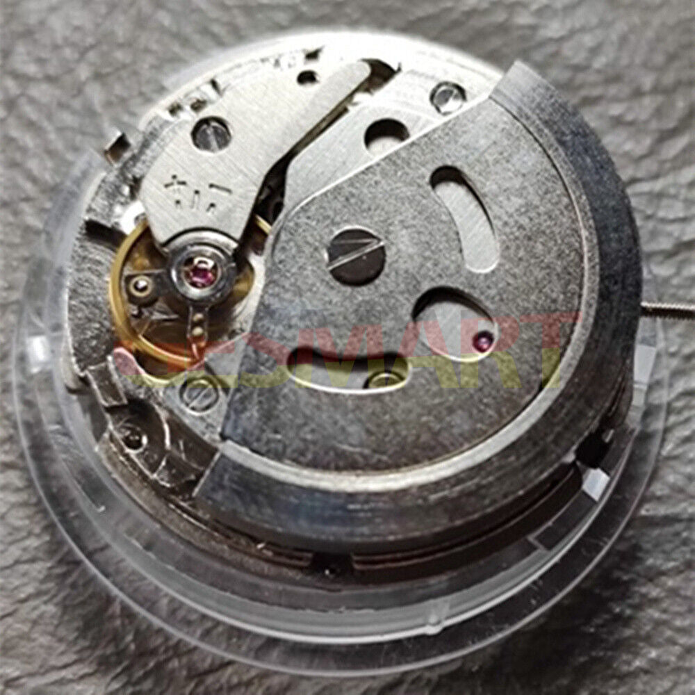 Orient automatic mechanical watch movement with big date, precision-engineered for accurate timekeeping.