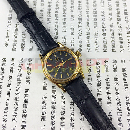 Tianjin Seagull black round ladies watch with gold nail markers and manual mechanical movement, elegant accessory