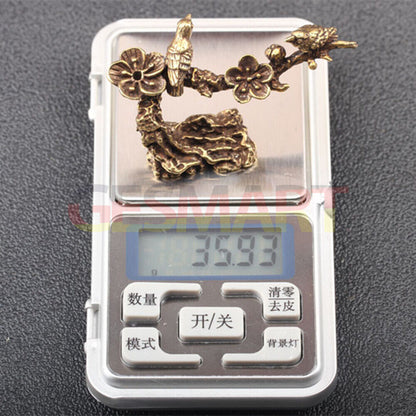 Hand-carved bronze magpie on solid copper blooming flowers trinket, elegant decor accessory.