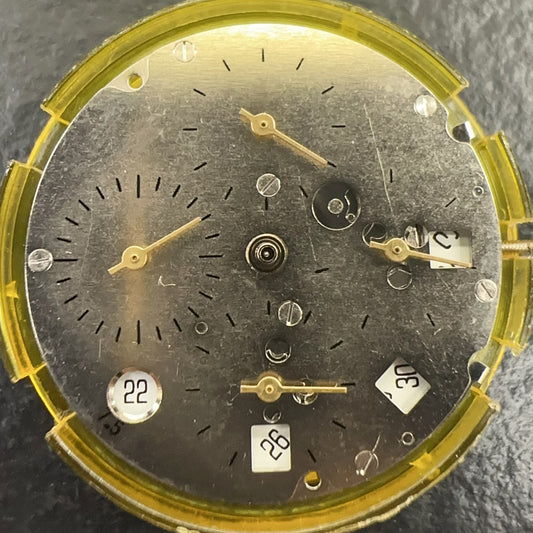 Mingzhu watch accessory showing mechanical movement with single calendar date at 7.5 and small second subdials at 3, 6, 9, and 12 positions.