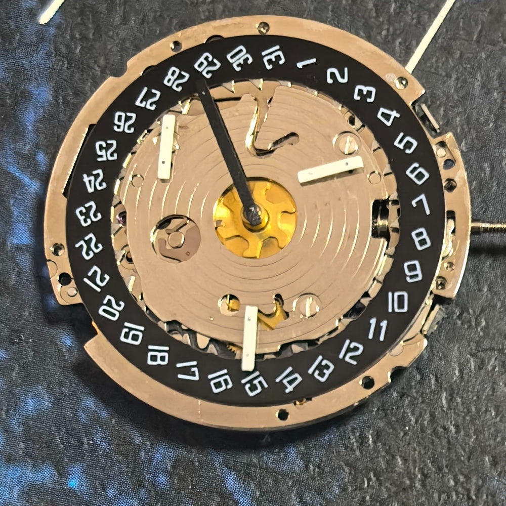 Swiss ISA 8171A quartz watch movement with 6 hands and black date disk at 4 o'clock, ideal for replacements.