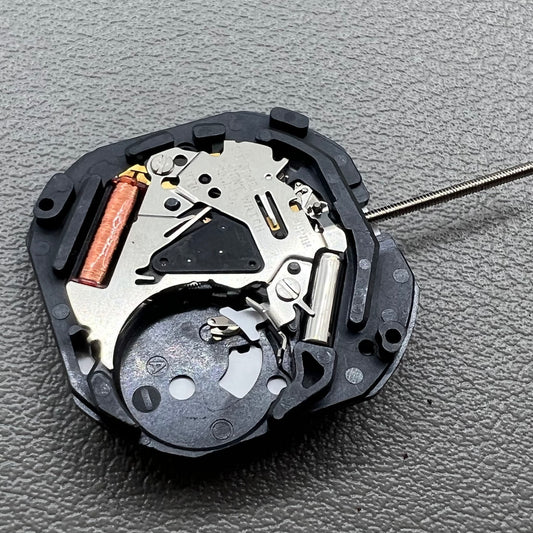 Orient Japan HT711 quartz watch accessory with 3 hands and date display at 6 o?clock, sleek design.