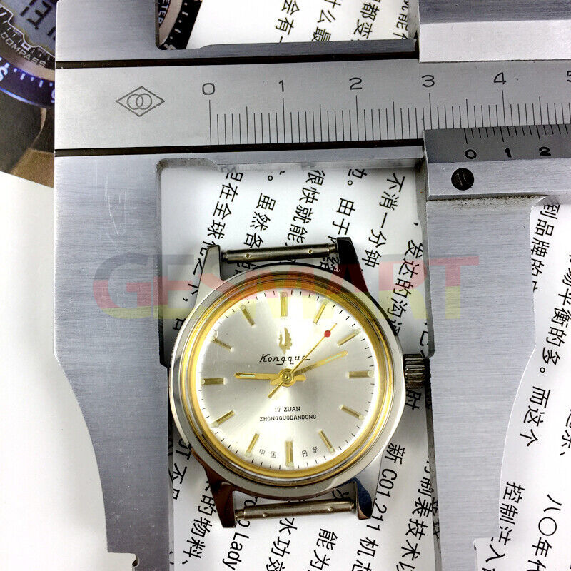 33mm Dandong manual watch with silver dial, golden markers, and 17-jewel precision movement by Dandong.