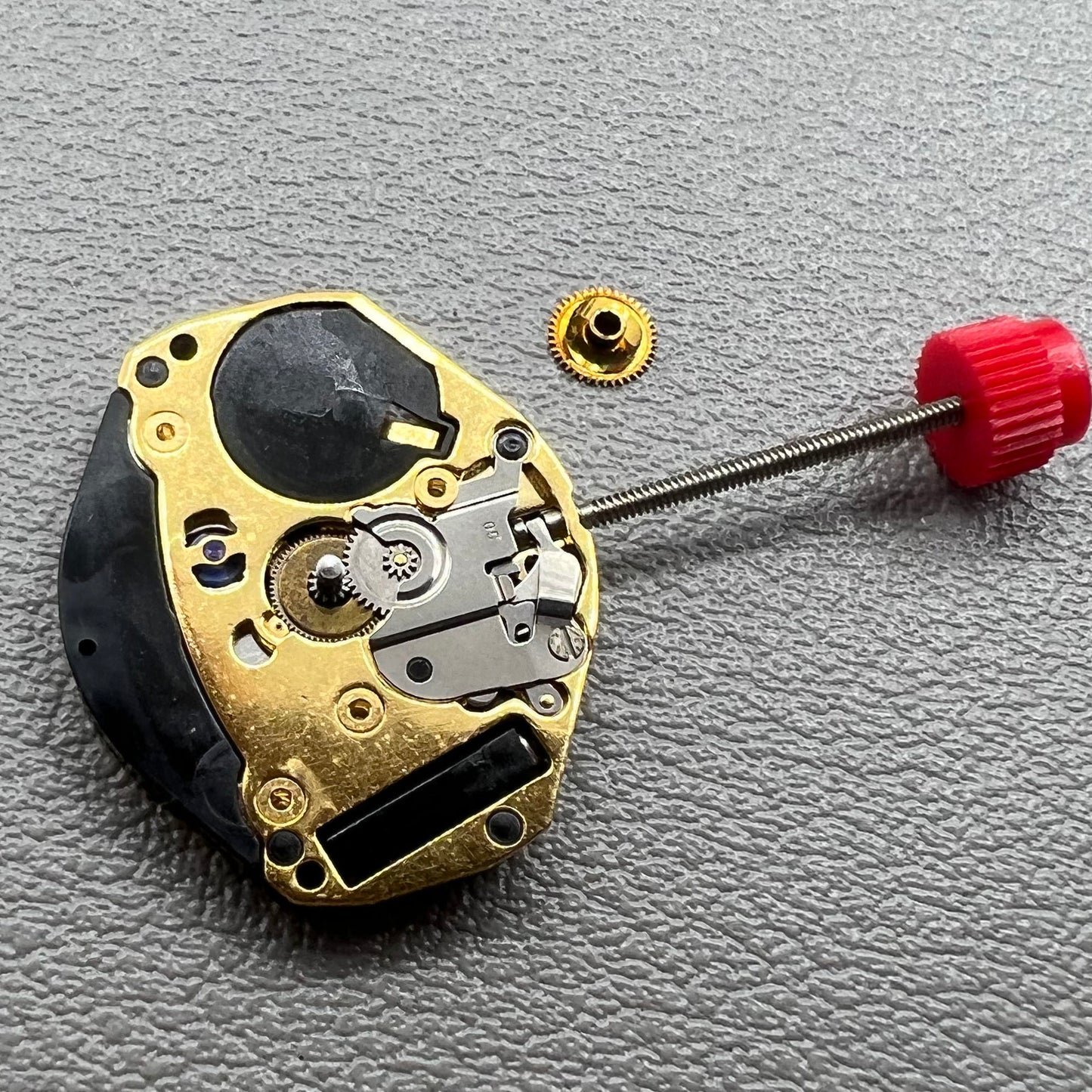 Swiss ETA 902.002 quartz watch movement with two hands, precision engineering by ETA.