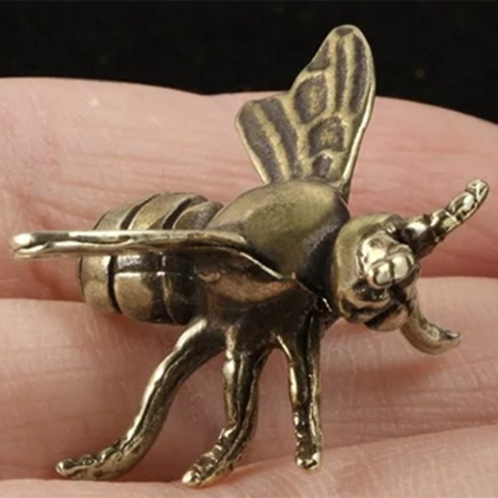 Hand-carved solid copper bee trinket in vintage bronze finish, perfect for watch accessory display.