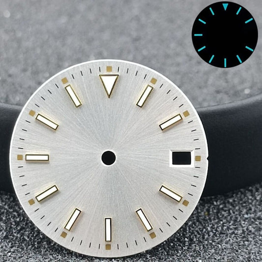 28.5mm silver watch dial with blue luminous markers and golden nails, calendar feature for NH35 movement.