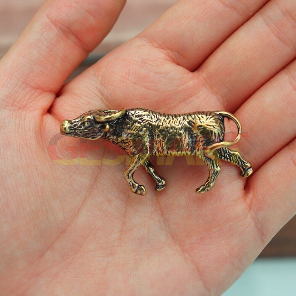 Hand-carved solid copper Buffalo trinket figurine, perfect rustic decor accessory.