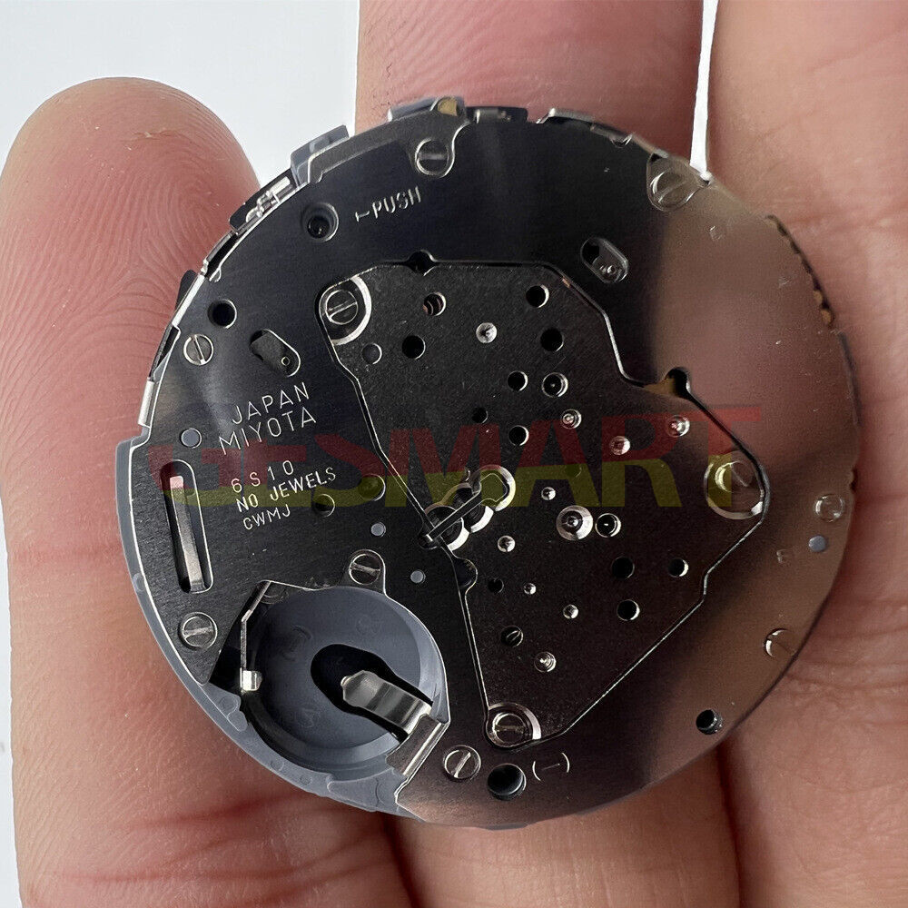 Miyota 6S10 Quartz watch movement with date at 3, three hands, small second subdials at 6, 9, and 12 positions.
