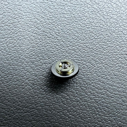 Black counting wheel for ETA C01.211 watch movement, precision replacement part for watch repair.