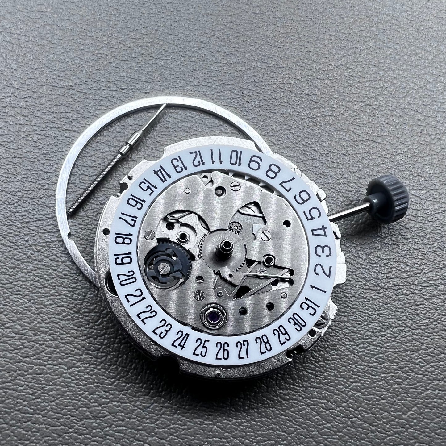 Miyota 8200 watch movement with single calendar date at 6 o'clock, precise Japanese mechanism.