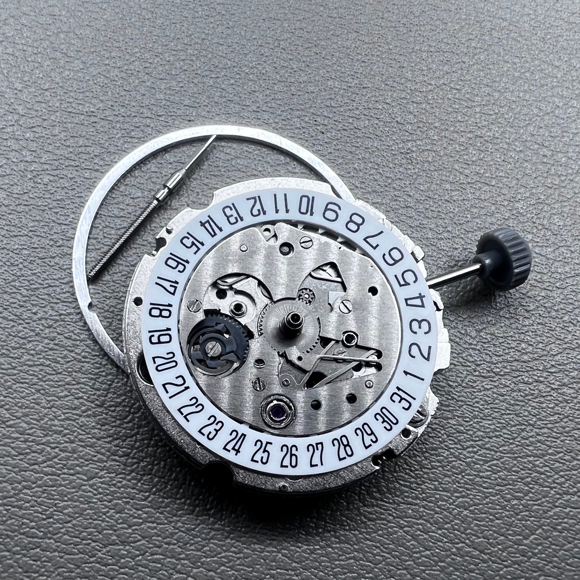 Miyota 8200 watch movement with single calendar date at 6 o'clock, precise Japanese mechanism.