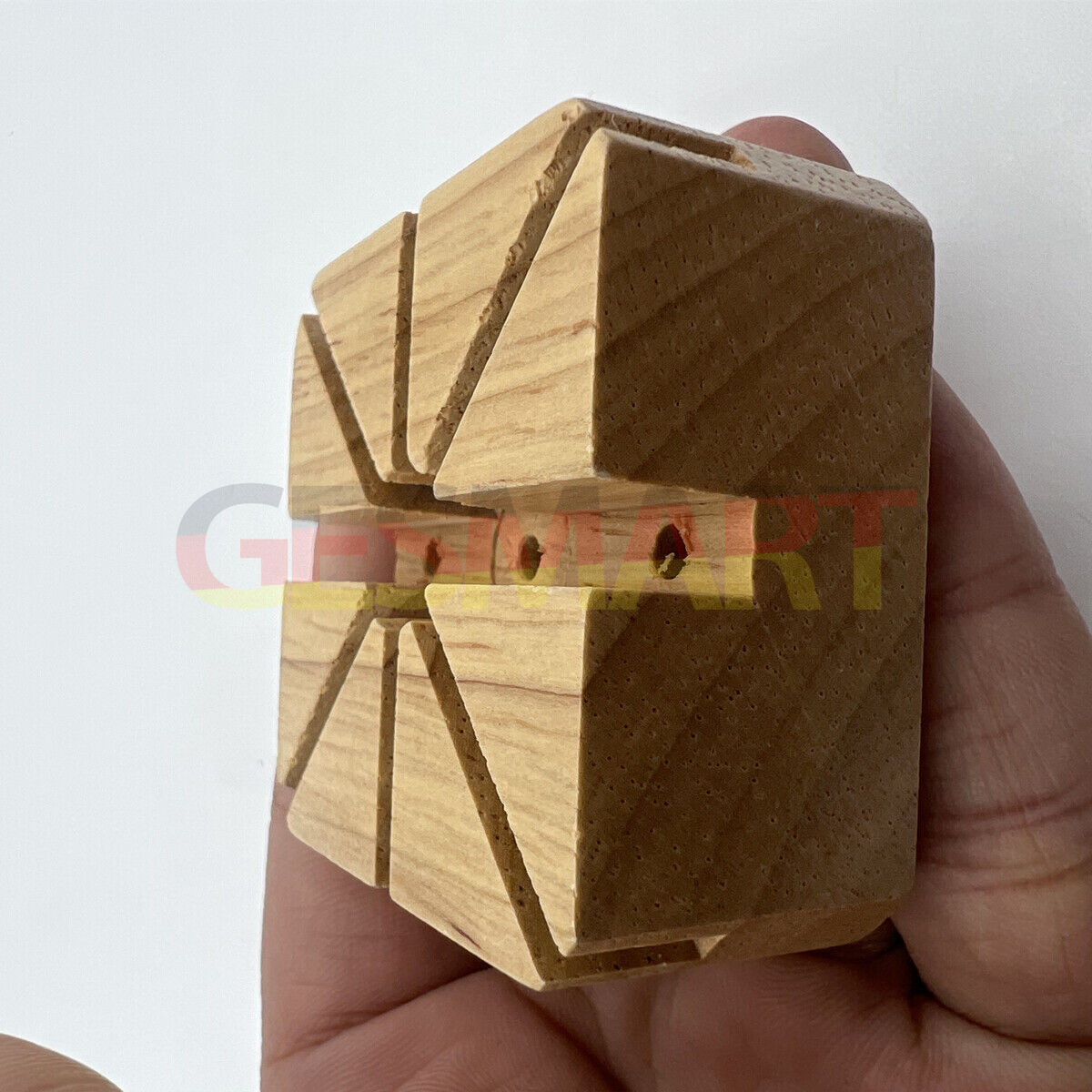 Wooden watch band holder for secure strap pin removal and repair tasks.
