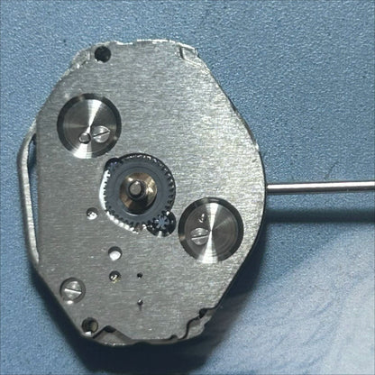 Japan Made Miyota 1L45 quartz movement with small second hand for precise watch repairs.