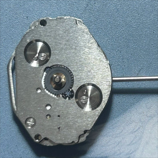 Japan Made Miyota 1L45 quartz movement with small second hand for precise watch repairs.