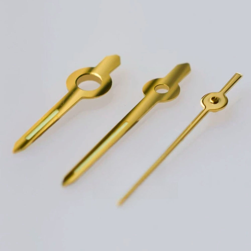 Golden trim green luminous watch hands for ETA2671 movement, enhancing visibility and style.