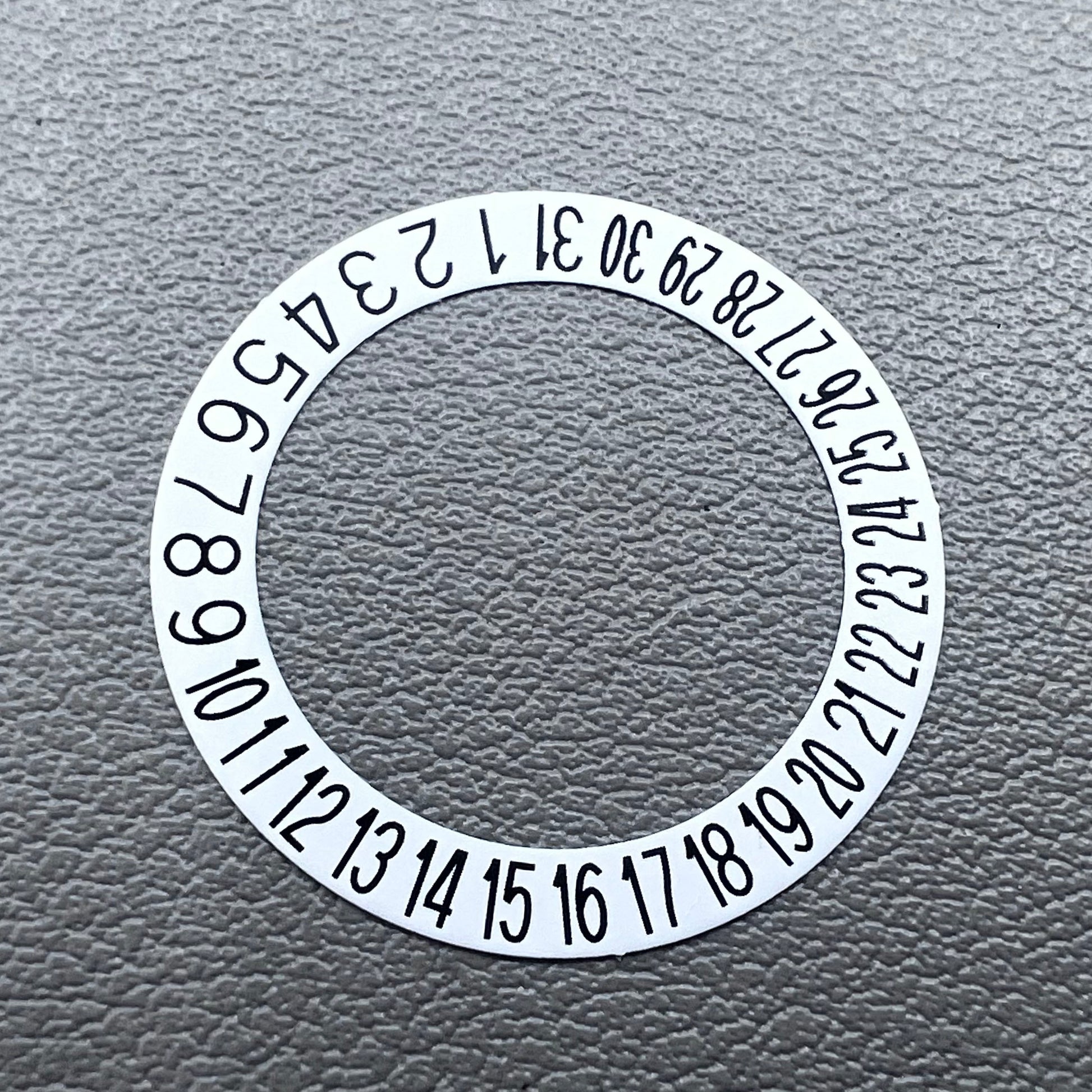 Black date wheel overlay with bold font on white background for NH35 NH36 watch movement, date at 6 o'clock, branded.