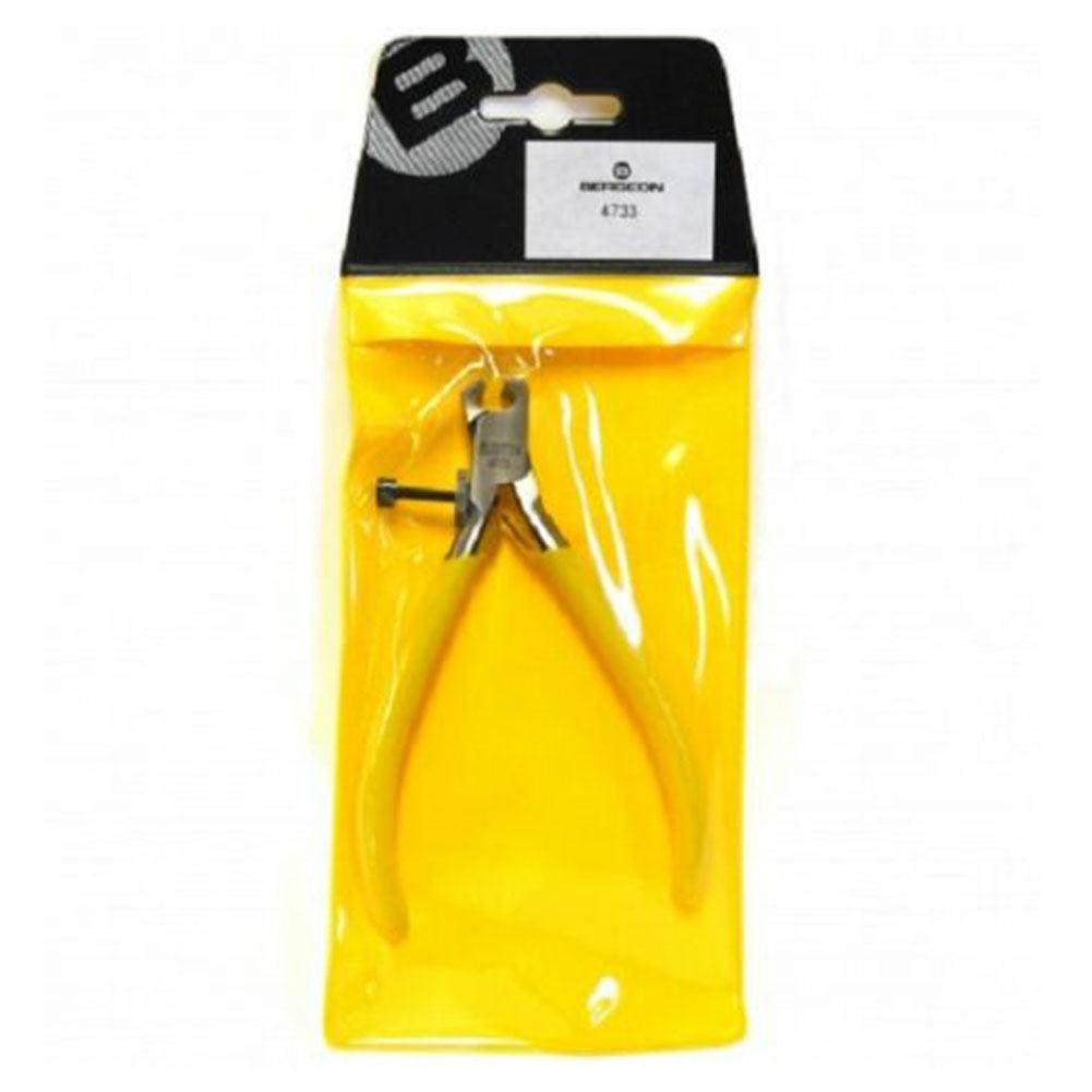 Bergeon 4733 watchmaker?s tool tightening cannon pinion for precise watch repair tasks.