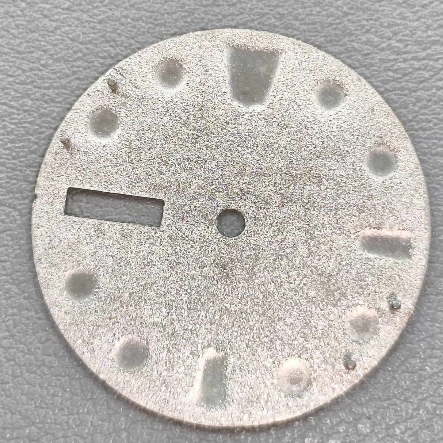 watch dial with S logo