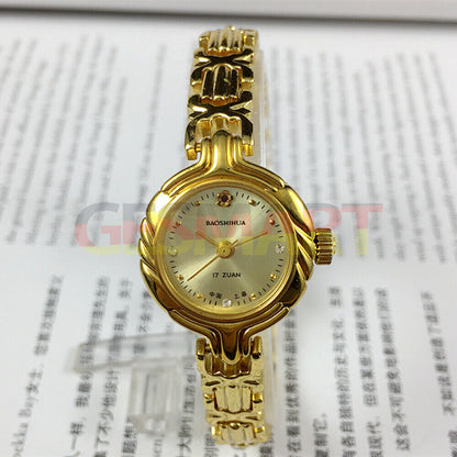 Baoshihua 22mm lady manual watch with 17 jewels and sparkling imitation diamond accents.