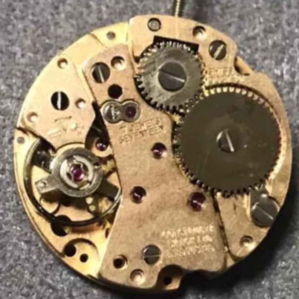 Close-up of Swiss Made RONDA MATIC 9037-21 manual winding watch movement components, showcasing precision engineering by RONDA.