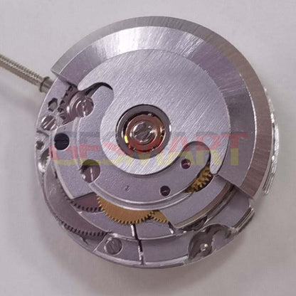 Silver ETA2671 mechanical watch movement with date at 3, China-made replacement for watch repair.