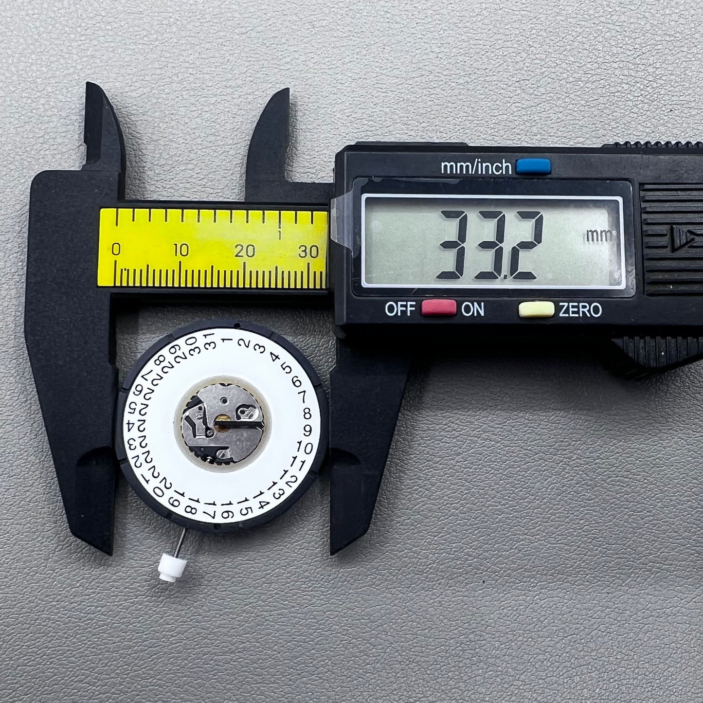 Swiss ISA 2334 quartz watch movement with date at 3 o?clock, precise timekeeping by Swiss ISA.