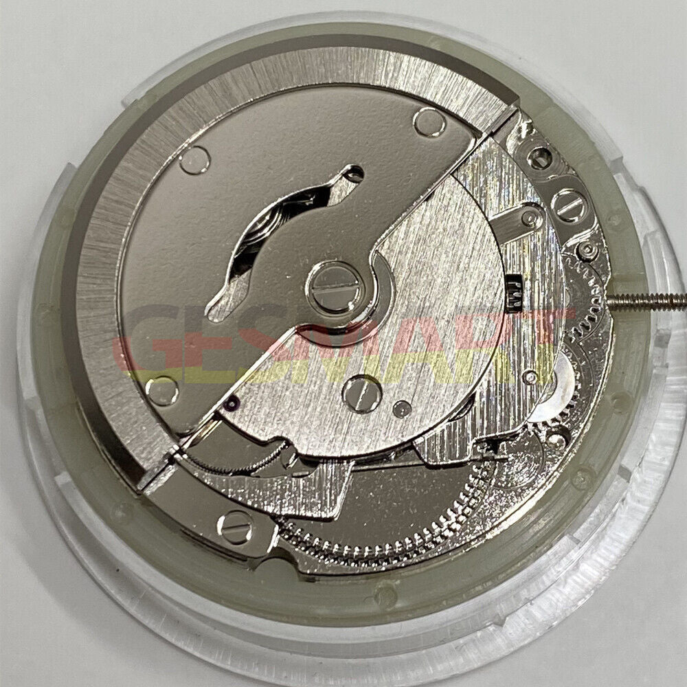 Asian Tianjin Seagull T16 watch with day-date function, automatic mechanical movement, and golden dial design.