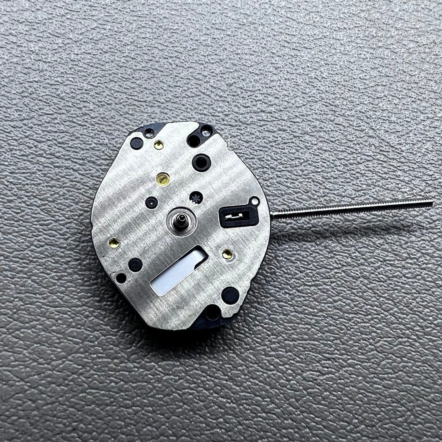 Japan Hattori Epson TMI AL35E quartz watch movement, precise timekeeping for repair and replacement.