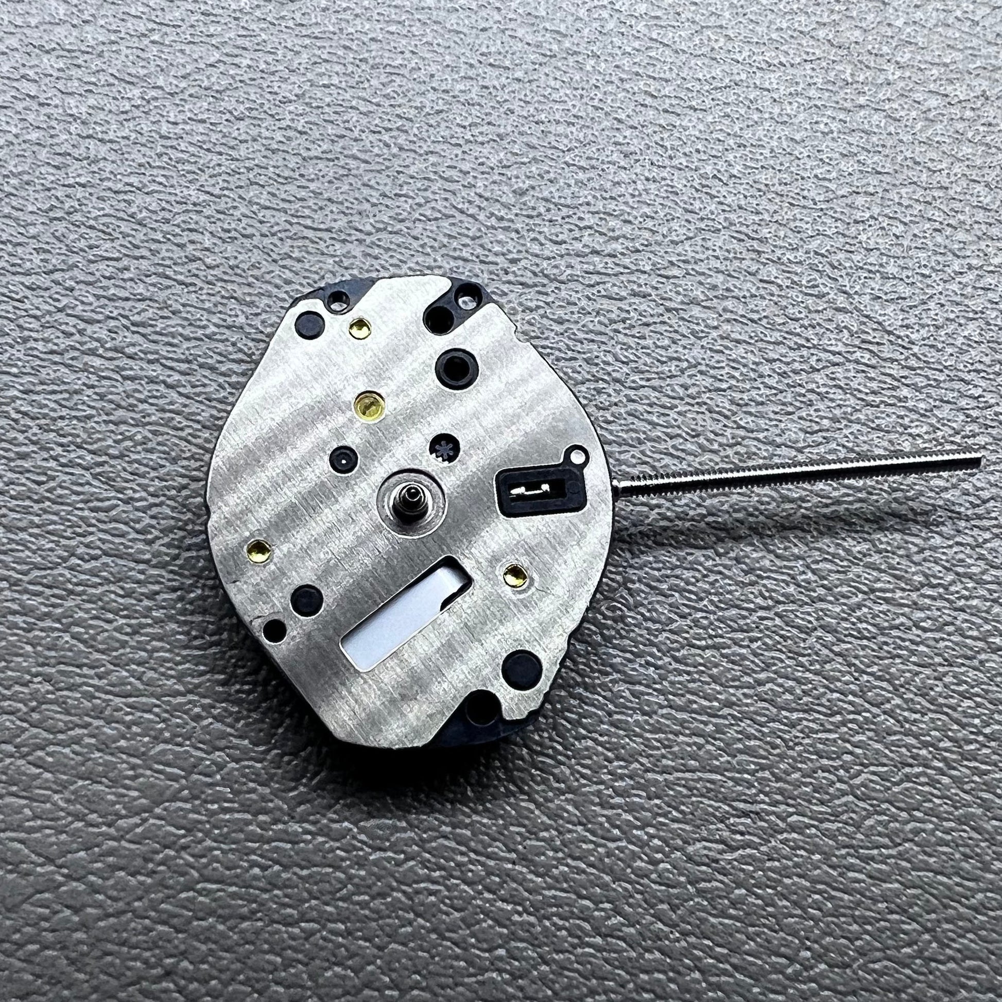 Japan Hattori Epson TMI AL35E quartz watch movement, precise timekeeping for repair and replacement.