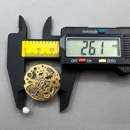 Golden 26.5mm hollow carved watch accessory with automatic 7120 mechanical movement, precision-engineered.