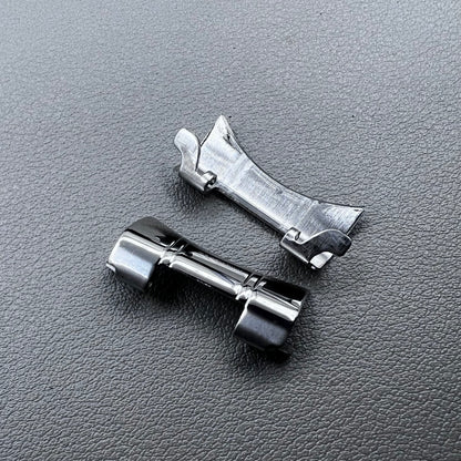 Set of 2 silver steel curved end links with spring bars for 24x12mm watch bands, enhancing bracelet fit.