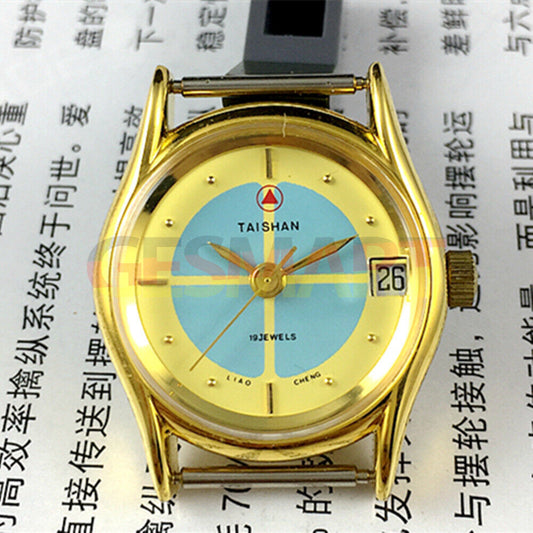Elegant 26mm TAISHAN lady watch with golden case, manual mechanical movement, 19 jewels, and single calendar display.