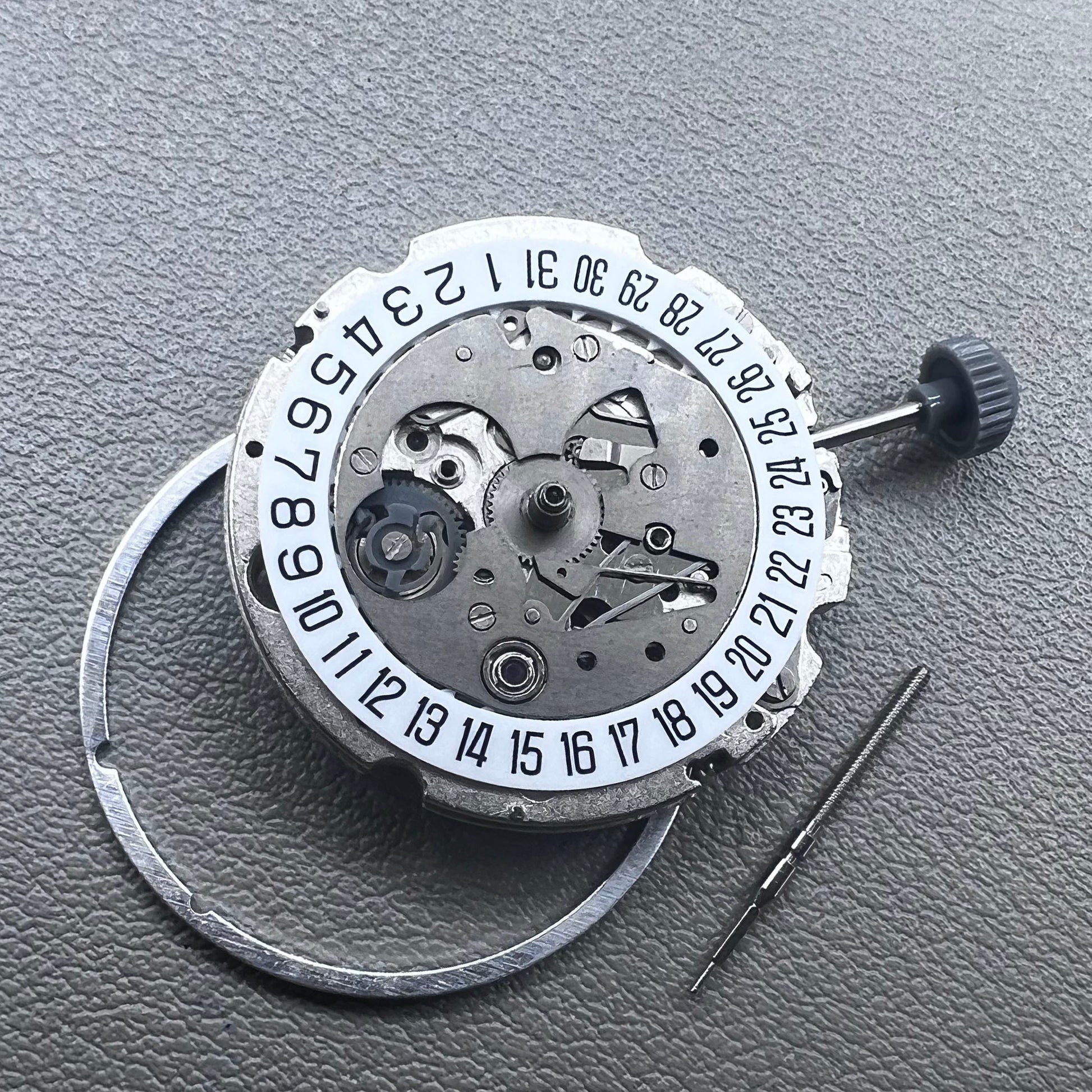Japan Miyota 8215 watch movement with white dial, automatic mechanical, date display at 6 o'clock by Miyota.