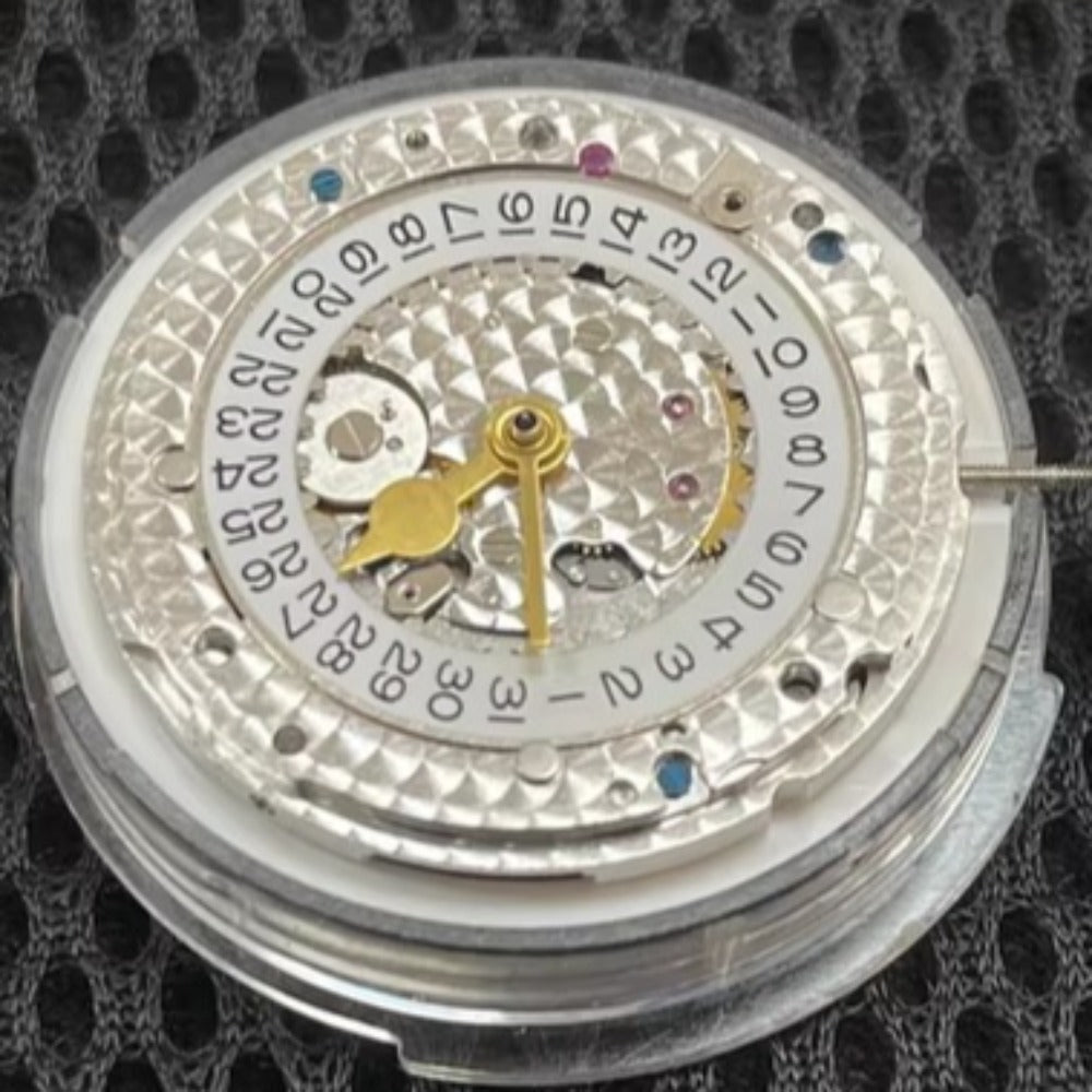 ETA 7750 automatic chronograph movement with day-date at 3, precision watch mechanism.
