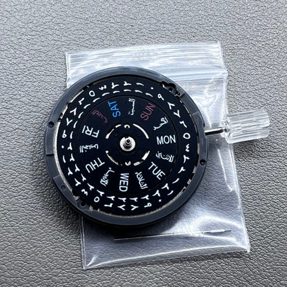 Seiko NH36 watch movement with black dial, Arabic numerals, date display, crown at 3:00 position