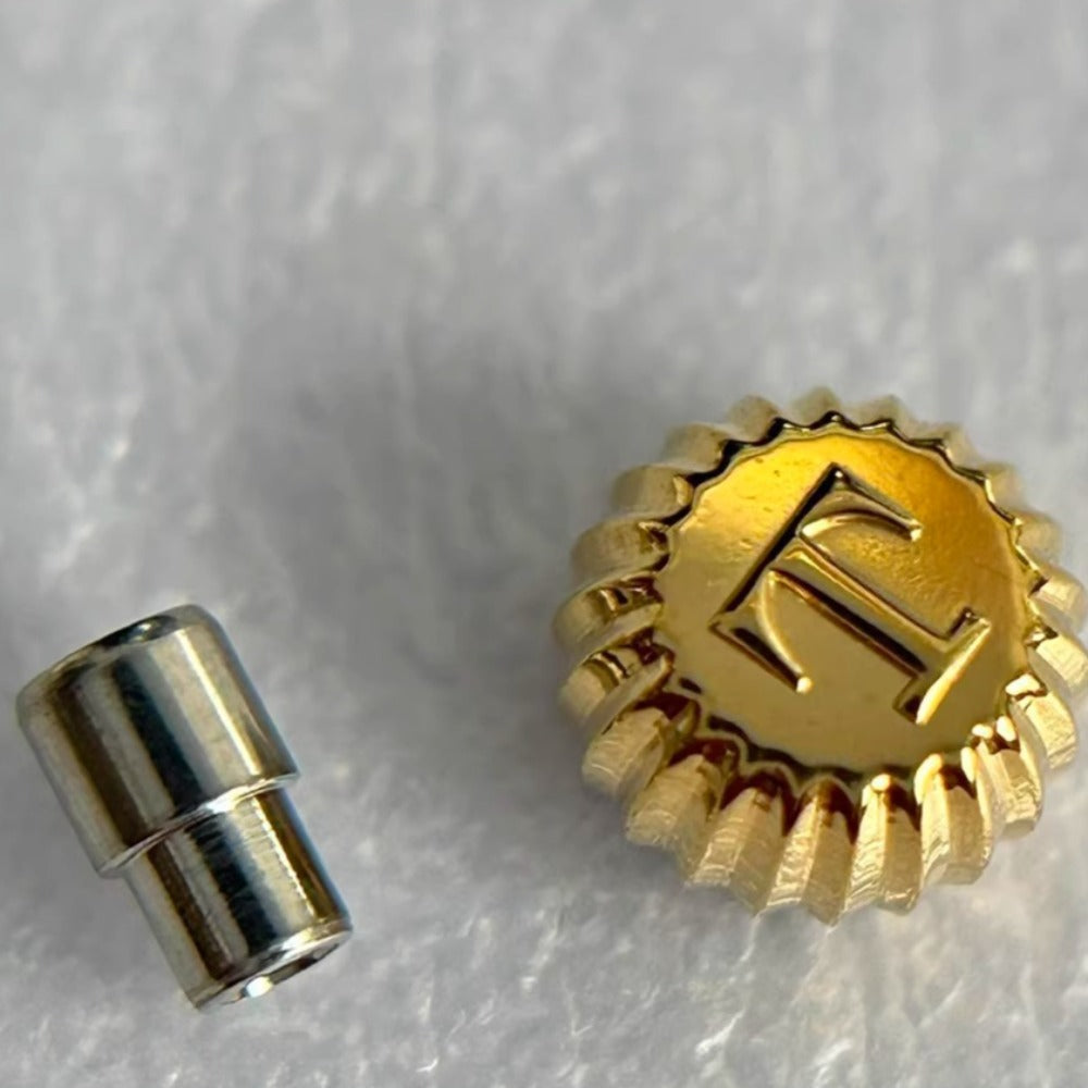 Steel golden watch crown for Tissot T109410, durable replacement part for precise watch repair.