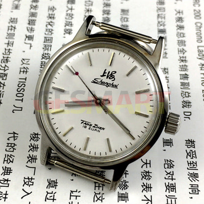 Shanghai Factory 32mm manual mechanical watch with 19 jewels, shock-resistant for lasting performance.