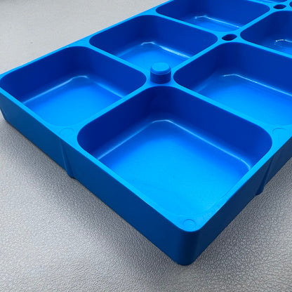 Swiss Horotec MSA17.530-B blue plastic watch accessory container with 10 compartments for organized storage.